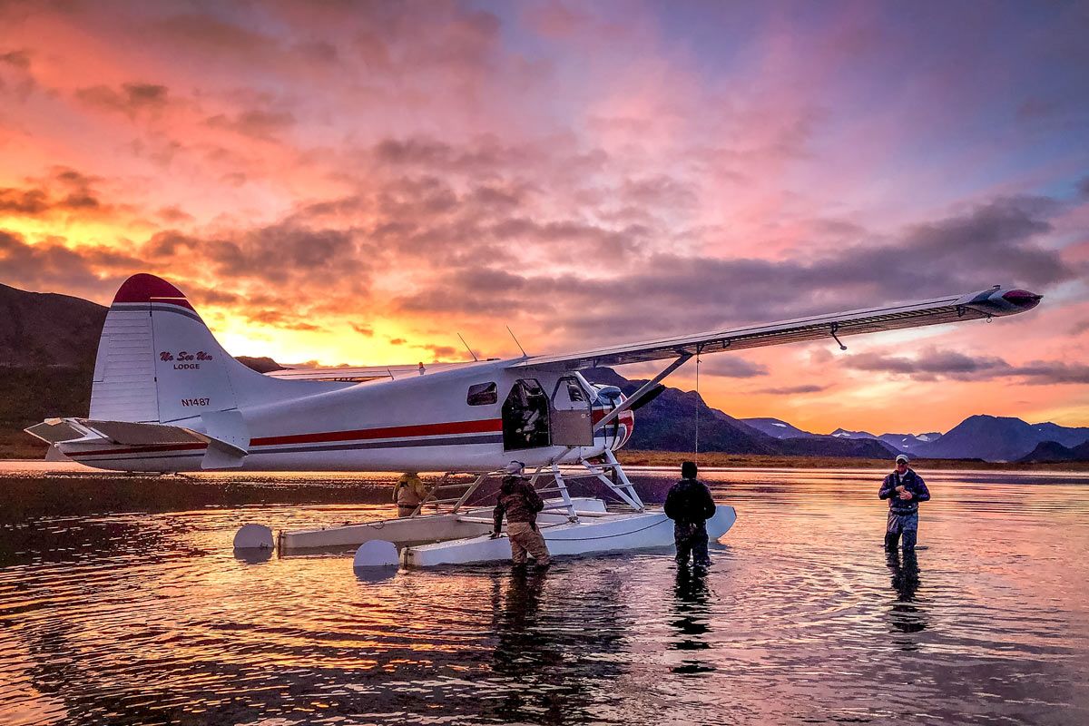 DeHavilland Beaver on floats with Alaska sunset
